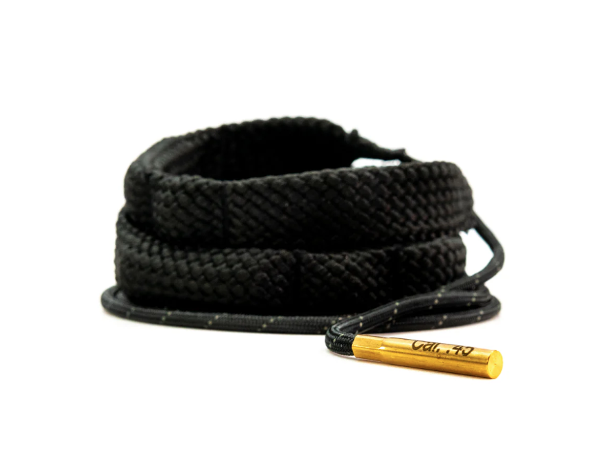 Coiled black rope with a brass end on a white background.