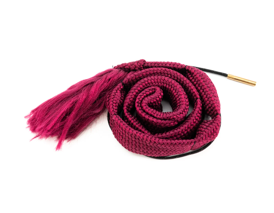Coiled pink and black rope with a brass end on a white background.