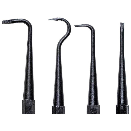 Set of four black dental tools on a white background