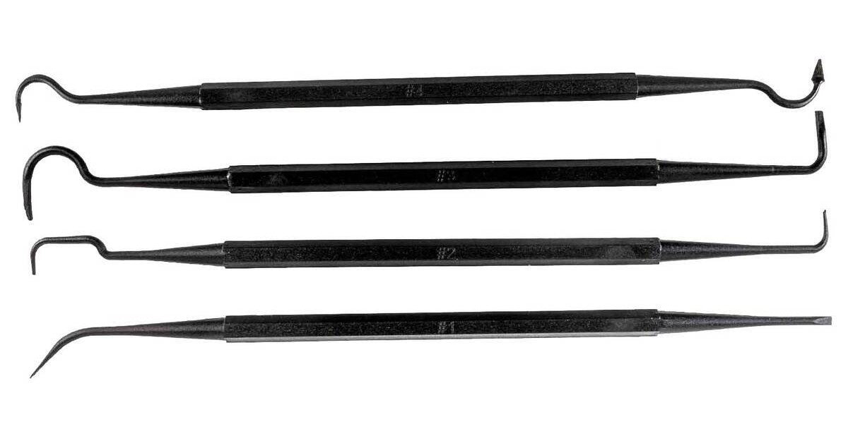 Set of four black plastic tools on a white background