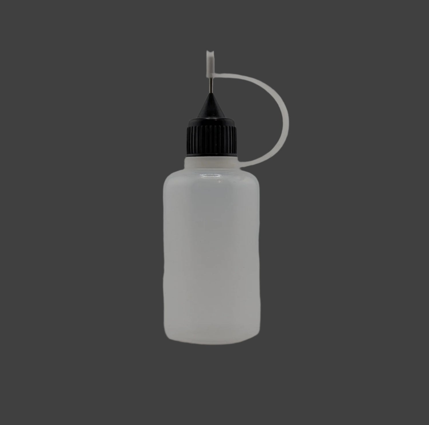 Clear plastic bottle with black cap on a gray background
